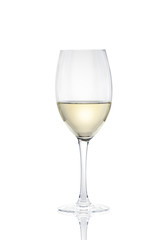 a glass of white wine on a white background.