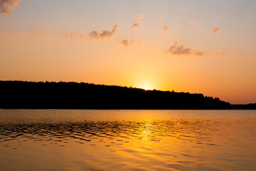 Fototapeta na wymiar Sunset on the lake