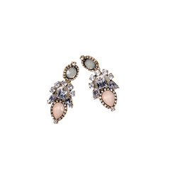 Pair of earrings with semiprecious stones on white background.