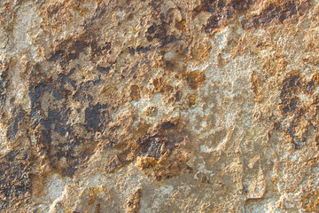 Bright brown granite texture with natural pattern. Background of natural stone.