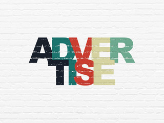Advertising concept: Advertise on wall background
