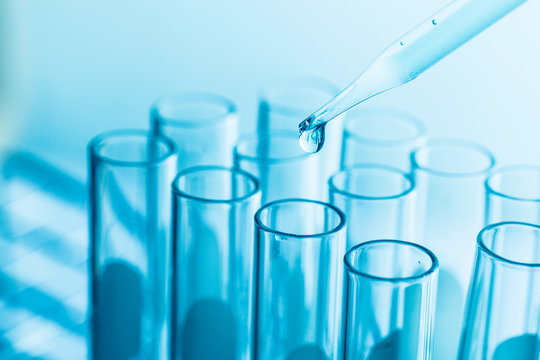 science research concept,Dropping chemical liquid to test tube,