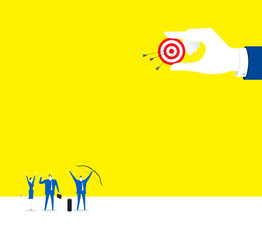 Team work / Three business people hit the target together.