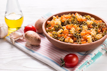still life with raw homemade pasta and ingredients for pasta.