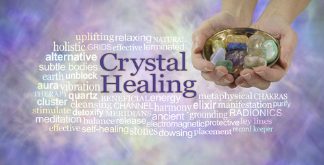 Crystal healing word cloud banner - female crystal therapist offering  a selection of crystals in a brass dish, surrounded by a relevant word cloud on an ethereal pastel colored background