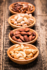 Mix nuts on wooden table,healthy vegan food.
