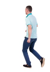 Back view of running man in blue polo. Walking guy in motion. Rear view people collection. Backside view of person. Isolated over white background.