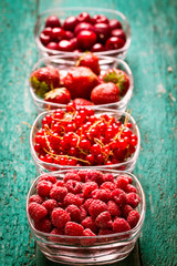 Fresh summer berries , wooden background, healthy food.