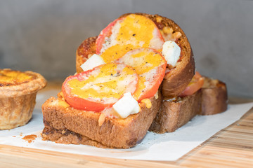 Warm bread tomatoes, cream cheese
