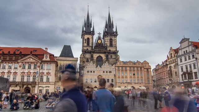 Old town square in Prague timelapse hyperlapse, Tyn Cathedral of the Virgin Mary and monument of Jan Hus.