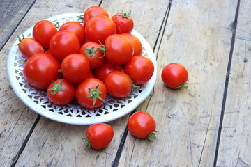 Fototapeta na wymiar Tomatoes on plate