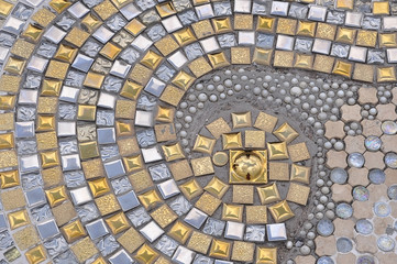 obblestone pavement with circular pattern useful for background