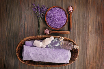 Beautiful spa composition with lavender on wooden table