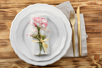 Beautiful table setting with flowers