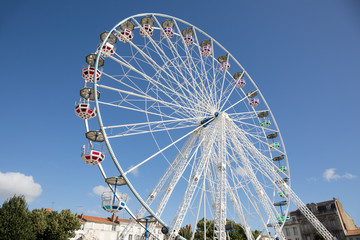 Vintage Retro Ferris Wheel on Blue Sky