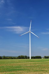 Fototapeta premium Eco power. Wind Turbine for alternative energy.