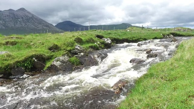 view to river and hills at connemara in ireland  36