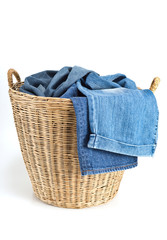 clothing for laundry in a wicker basket