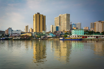 Fototapeta na wymiar Buildings along the Pasig River, seen from Fort Santiago, in Int