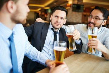 Businessmen at bar