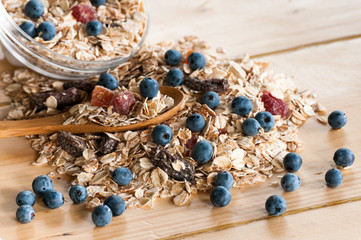 Serving of cereal in bulk on wooden table