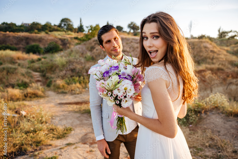 Canvas Prints Happy just married young wedding couple celebrating