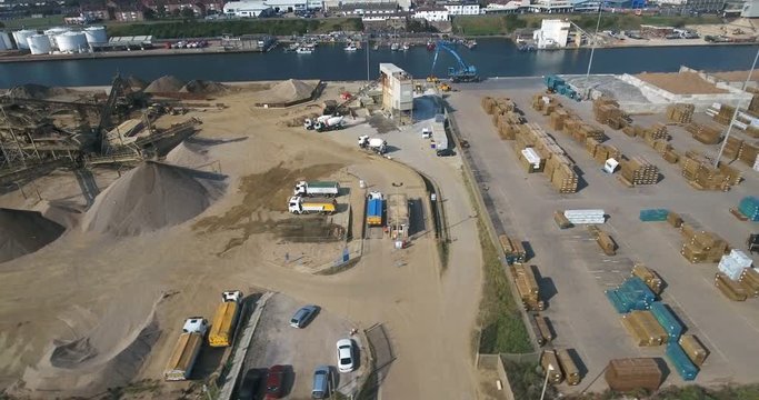 Aerial panning view of an industrial and commercial area near Brighton