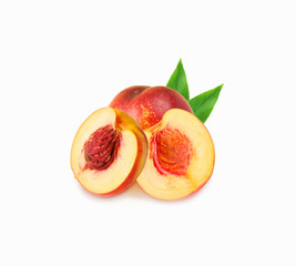 Peaches (nectarine) isolated on white. Peaches with leaves.