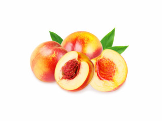 Peaches (nectarine) isolated on white. Peaches with leaves.