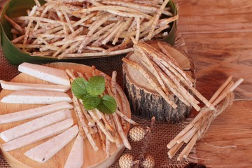 Fresh taro and taro stick with salt.