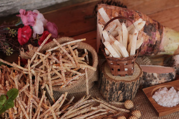 Fresh taro and taro stick with salt.