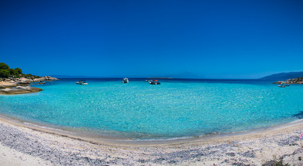 Fototapeta na wymiar Beautiful beach on Diaporos island near Sithonia, Halkidiki, Gre