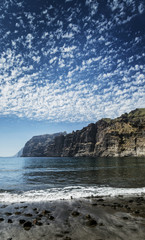 Naklejka premium los gigantes cliffs landmark and beach in tenerife spain