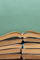 old books on a wooden shelf