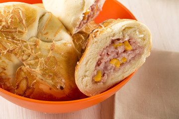 Brazilian snack fried with cheese ham on wooden background