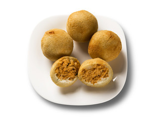 Brazilian snack. chicken dumpling with curd on white background.