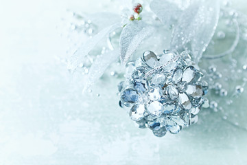 White and Silver Christmas Decorations on a Wooden Background