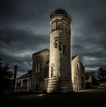 The Old Mackinaw Point Lighthouse In Michigan. The Mackinaw Lighthouse was built in 1889. It is currently operated by the state of Michigan and is a popular tourist attraction in Mackinaw City.