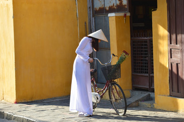 Beautiful  woman with Vietnam culture traditional dress,Ao dai is famous traditional costume ,vintage style,Vietnam