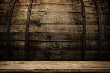 background of barrel and worn old table of wood