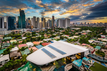 Fototapeta na wymiar View of the skyline of Makati at sunset, in Metro Manila, The Ph