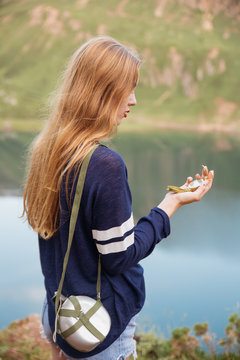 Compass in female hand