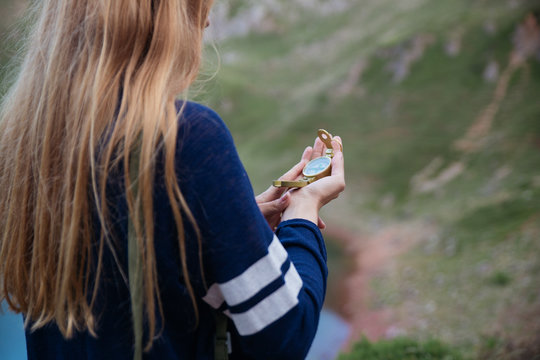 Compass in female hand