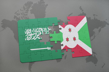 puzzle with the national flag of saudi arabia and burundi on a world map background.