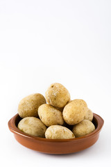 Canarian potatoes (papas arrugadas) isolated on white background

