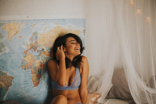 Portrait of sexy spanish woman at home