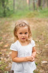 Portrait of a young girl on the nature