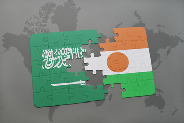 puzzle with the national flag of saudi arabia and niger on a world map background.