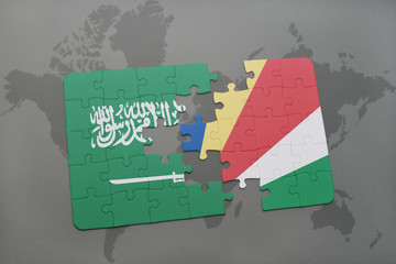 puzzle with the national flag of saudi arabia and seychelleson a world map background.