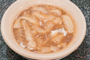 Chinese-styled Fish maw soup in deep bowl
